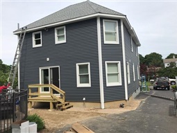 House with new siding installed