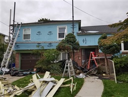 Beginning stages of adding vinyl siding