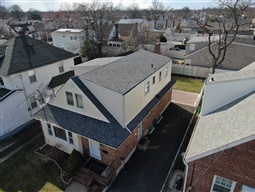 completed installation of cedar shingle roofing