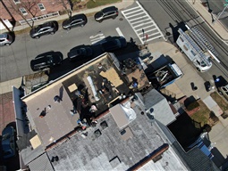 Contractors in the middle of flat roof project