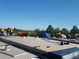 Contractors working on roof