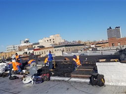 Our roofing contractors for New York flat roof project